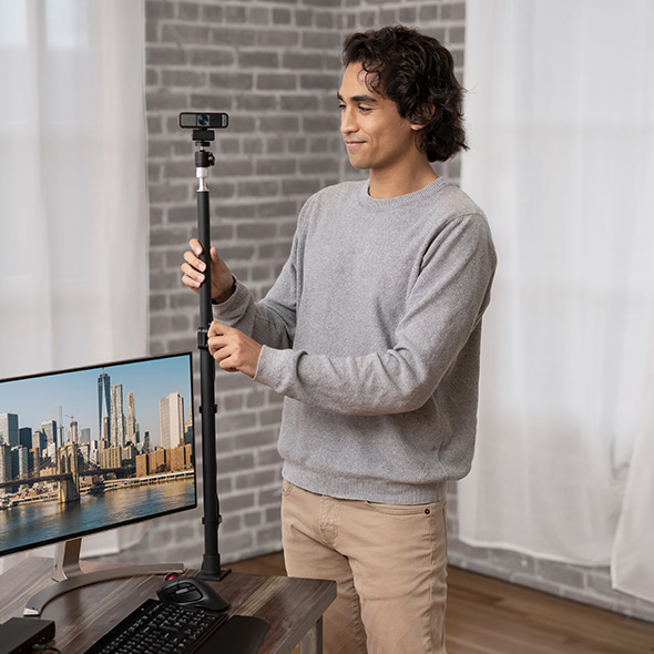 Woman having a videocall using her Audio Switch.