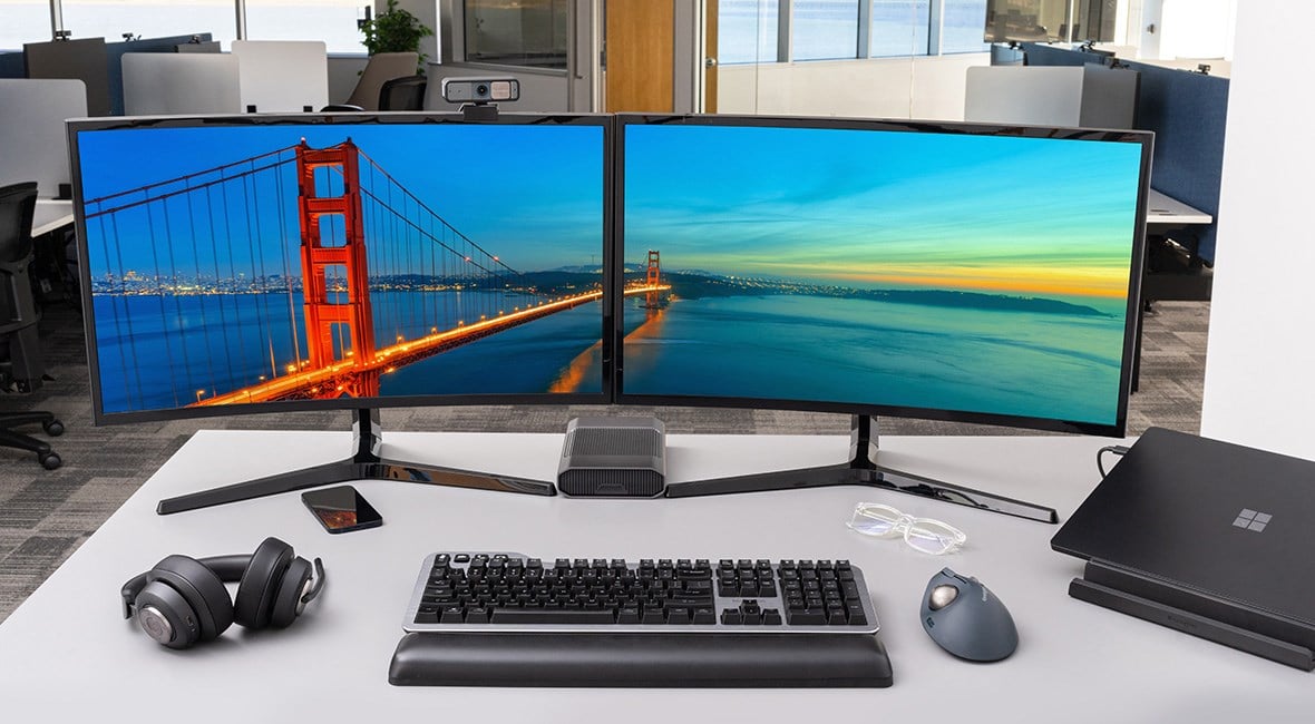 Desk set up of silent mechanical keyboard with wrist rest and trackball.